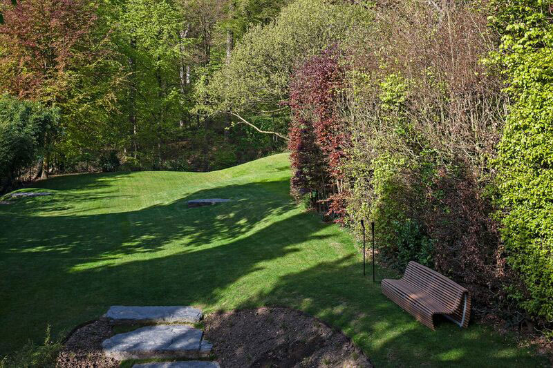 <span>R&eacute;alisations</span><i>→</i>