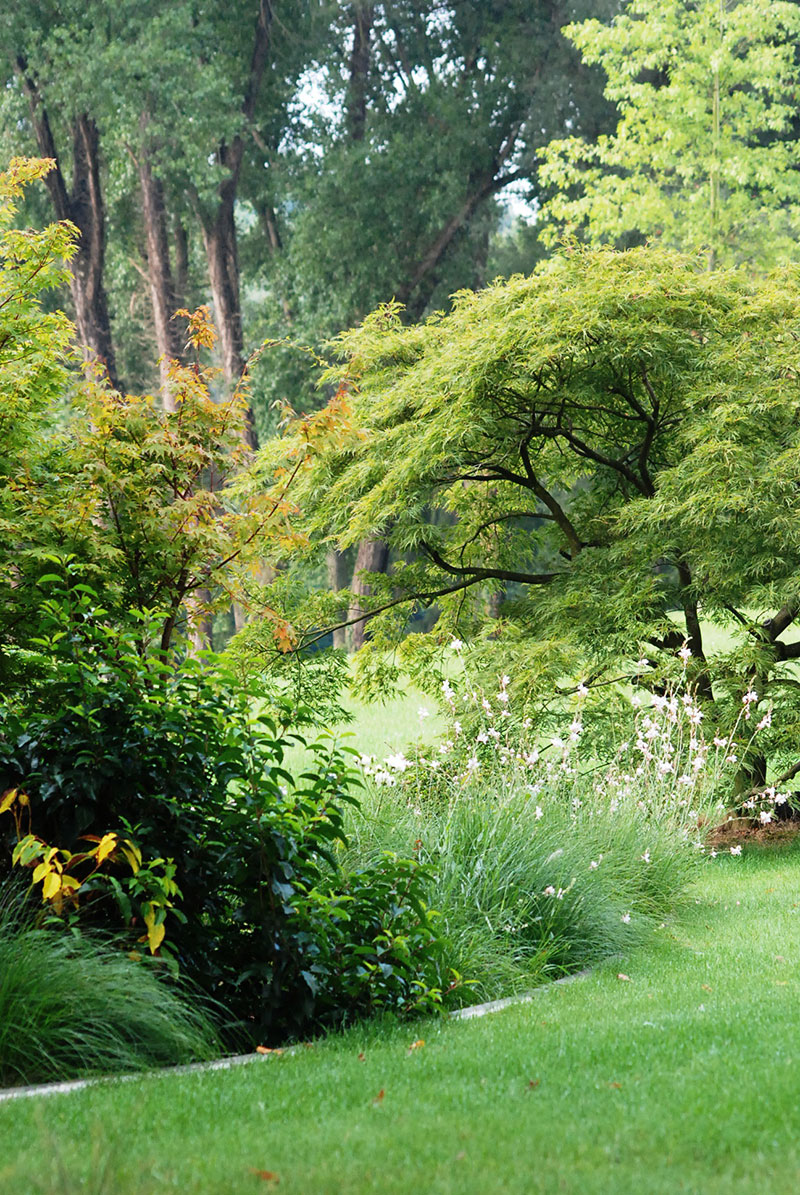 <span>R&eacute;alisations</span><i>→</i>