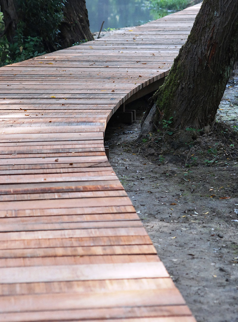 <span>R&eacute;alisations</span><i>→</i>