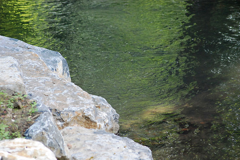 <span>R&eacute;alisations</span><i>→</i>