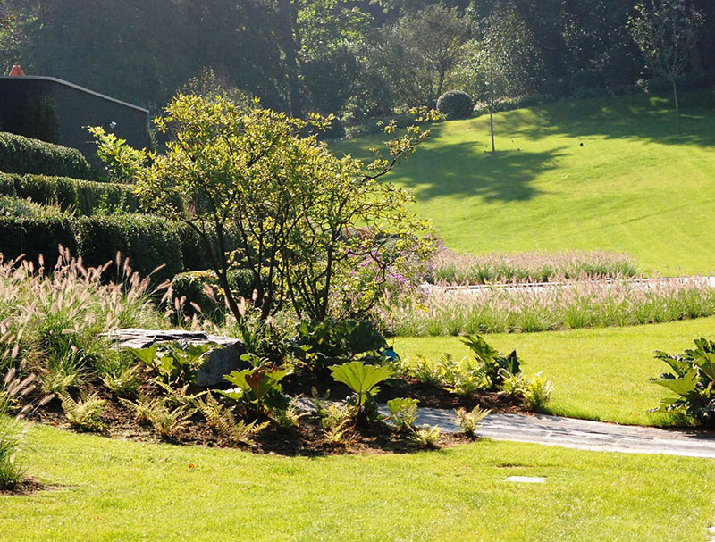 <span>R&eacute;alisations</span><i>→</i>