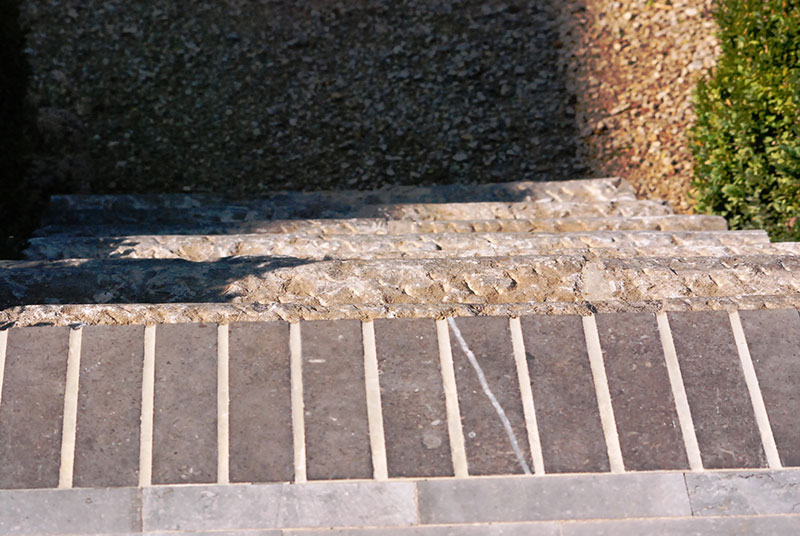 <span>R&eacute;alisations</span><i>→</i>