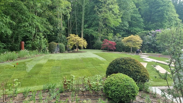 <span>R&eacute;alisations</span><i>→</i>