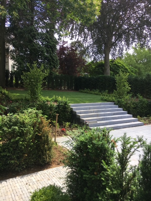 <span>R&eacute;alisations</span><i>→</i>