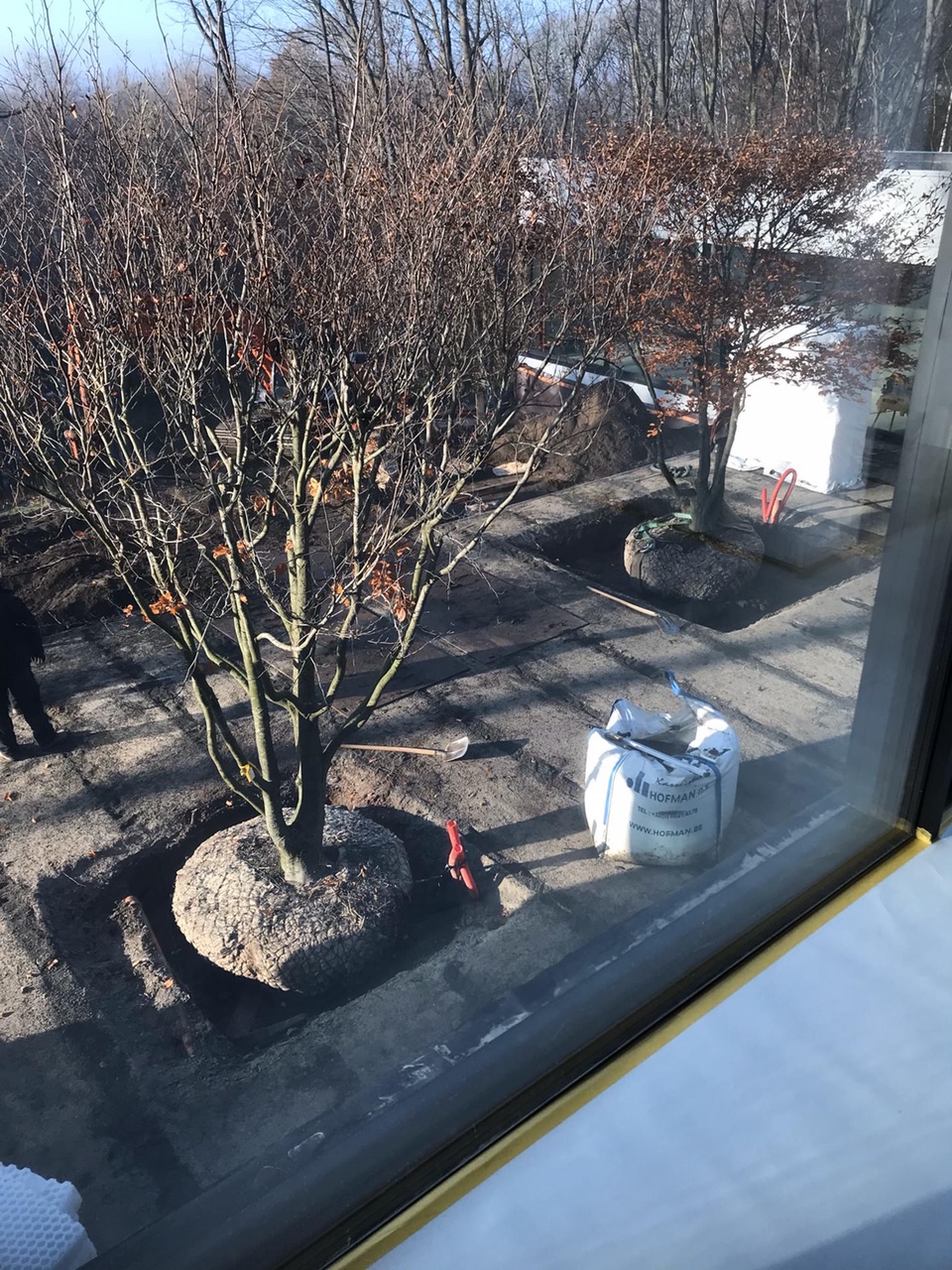 <span>R&eacute;alisations</span><i>→</i>