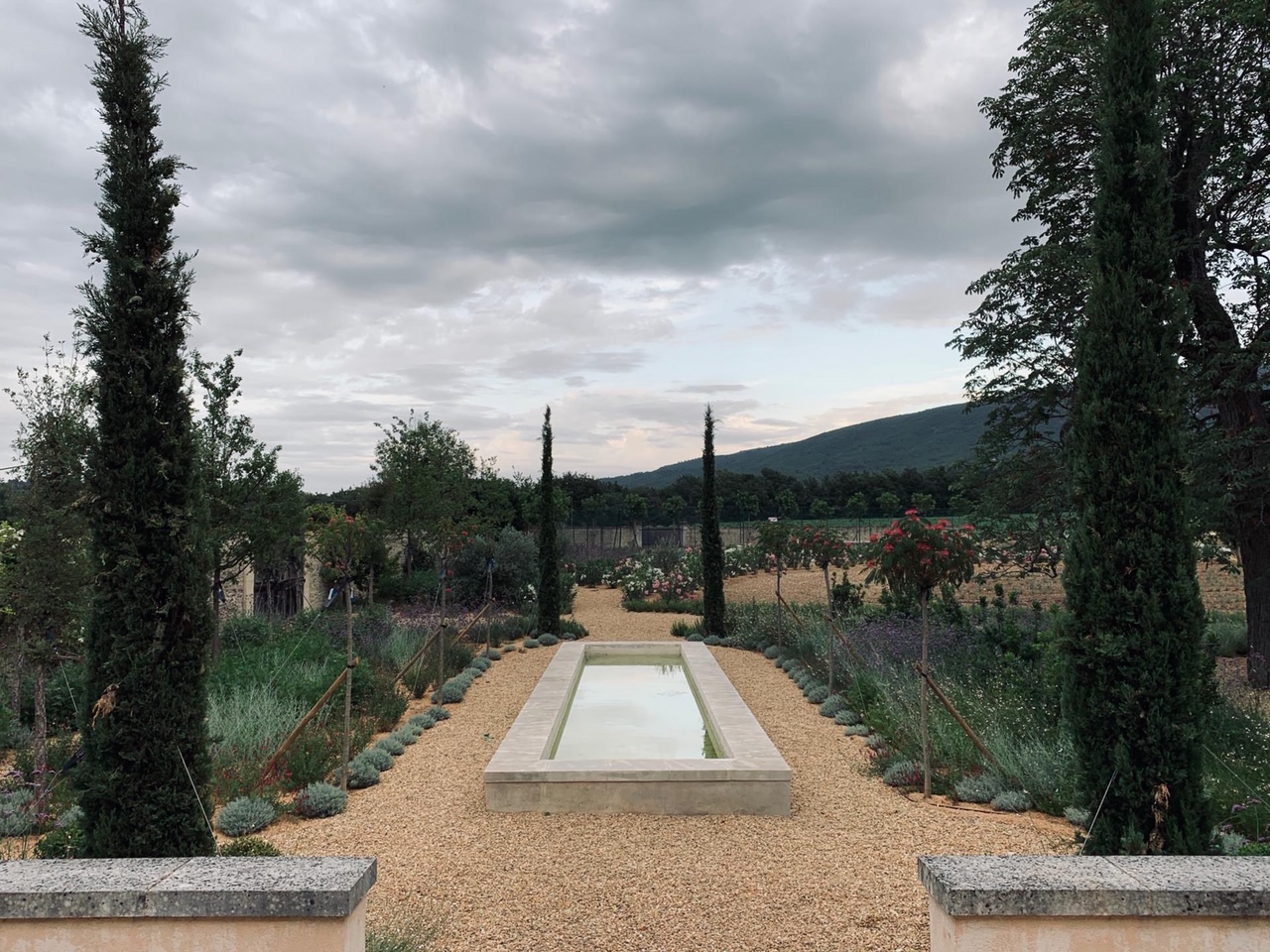 <span>R&eacute;alisations</span><i>→</i>