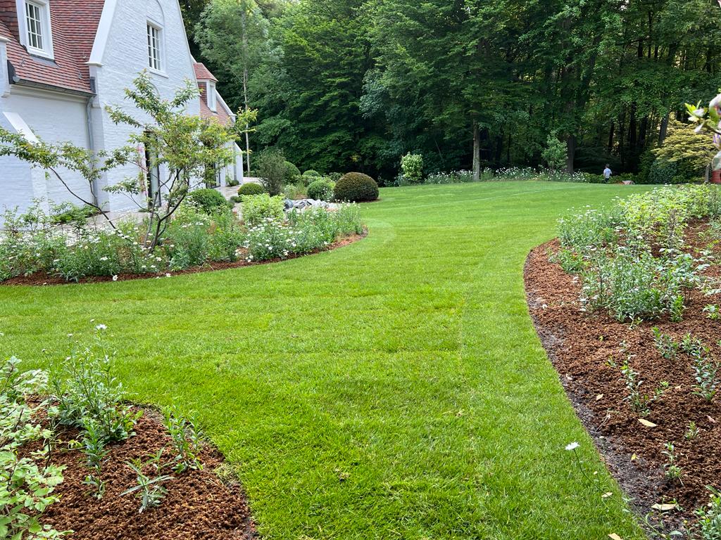 <span>R&eacute;alisations</span><i>→</i>