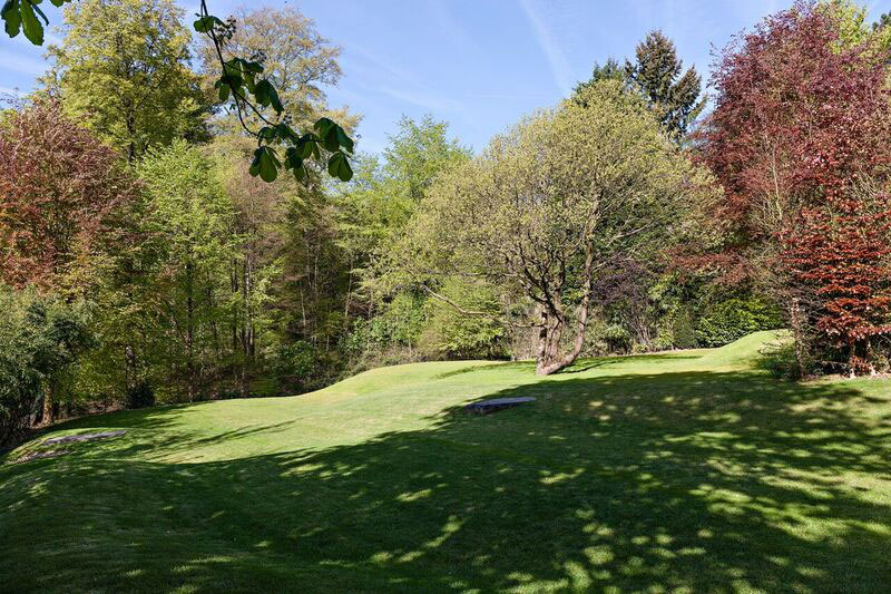 <span>R&eacute;alisations</span><i>→</i>