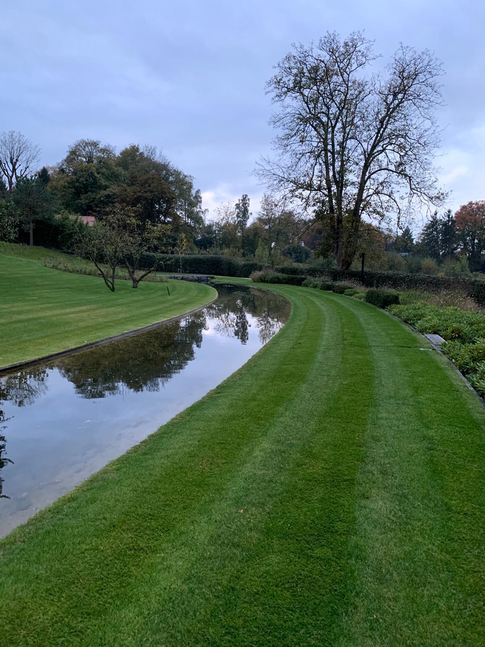 <span>R&eacute;alisations</span><i>→</i>