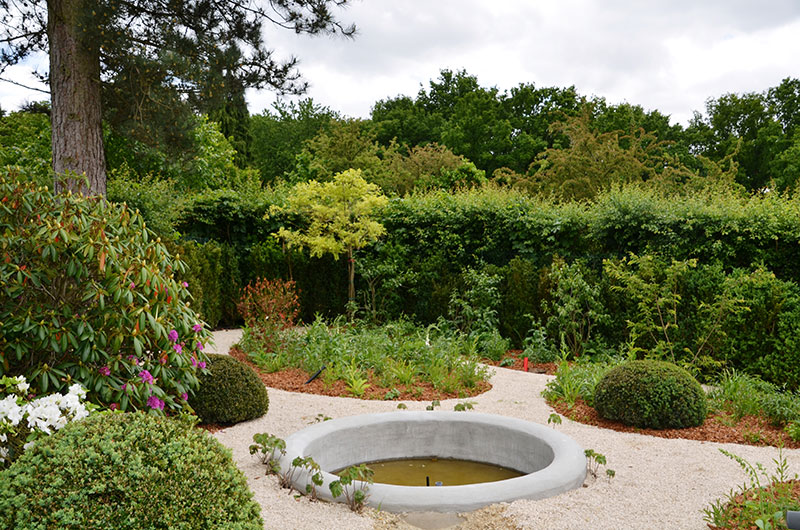 <span>R&eacute;alisations</span><i>→</i>