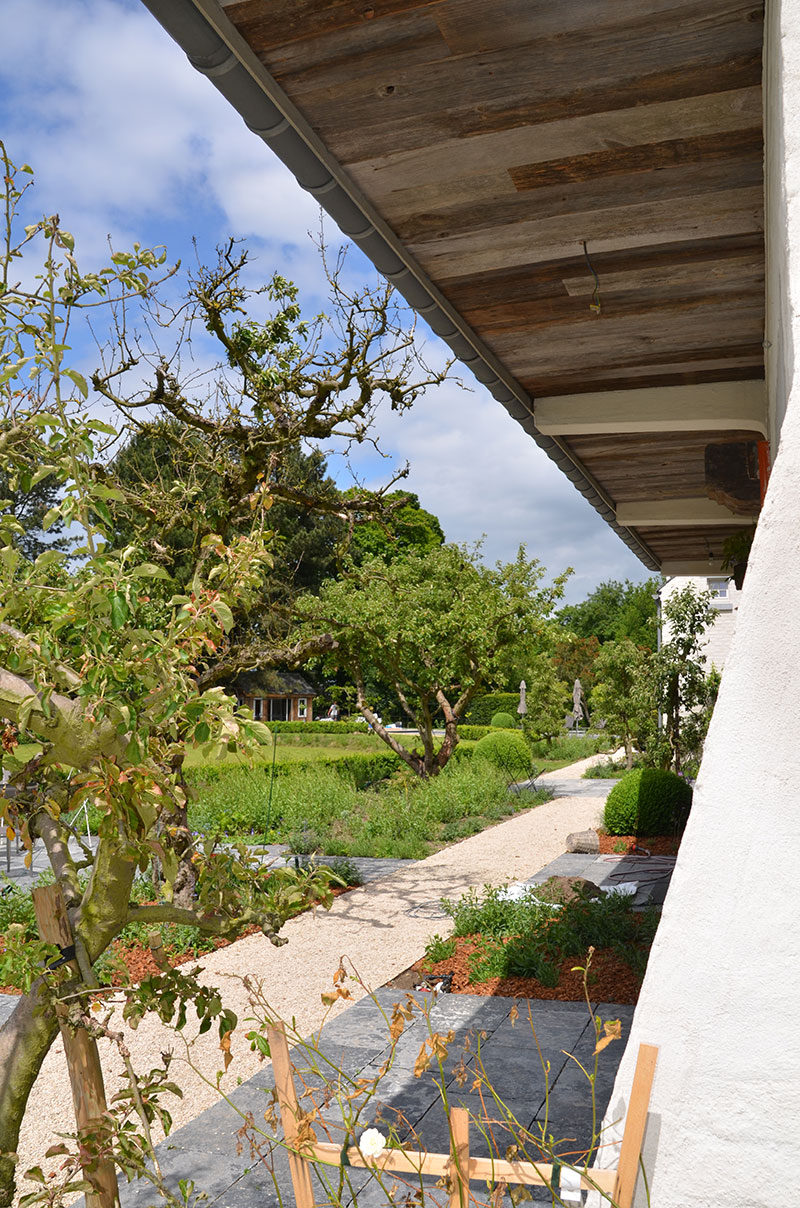 <span>R&eacute;alisations</span><i>→</i>