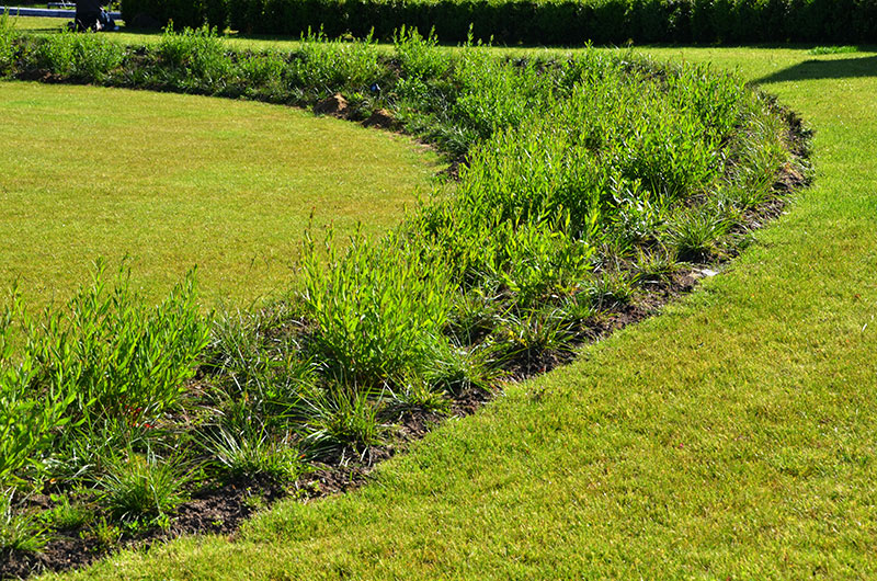 <span>R&eacute;alisations</span><i>→</i>