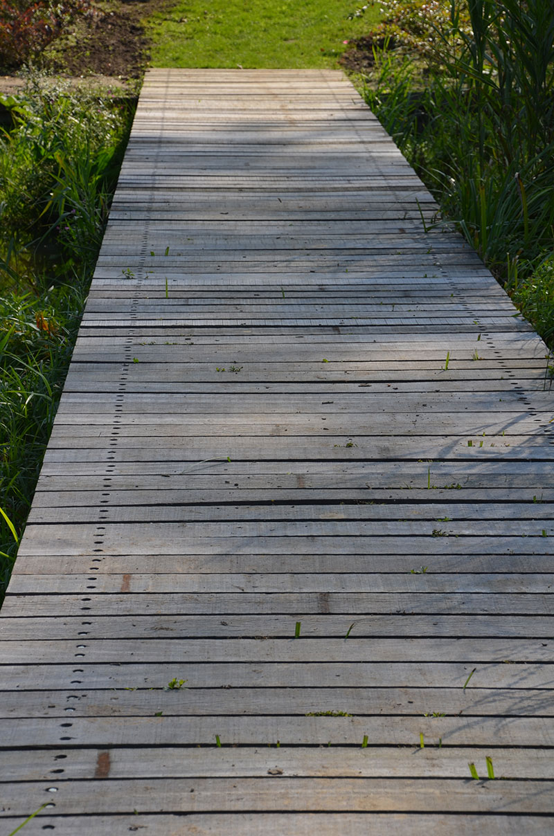 <span>R&eacute;alisations</span><i>→</i>