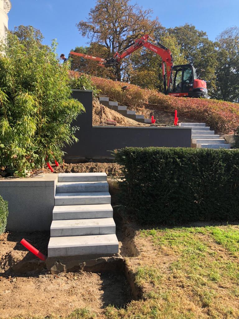 <span>R&eacute;alisations</span><i>→</i>