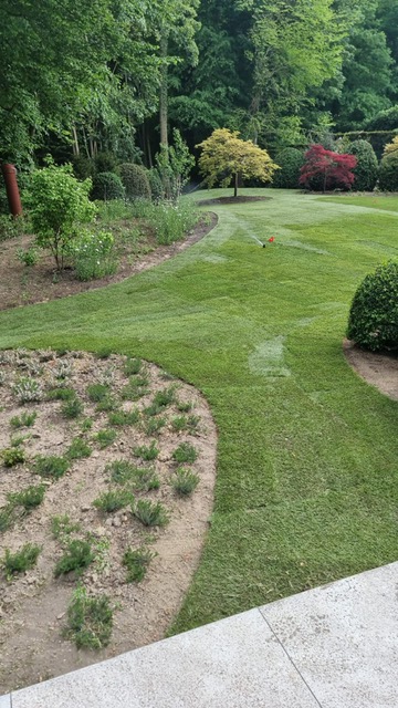 <span>R&eacute;alisations</span><i>→</i>