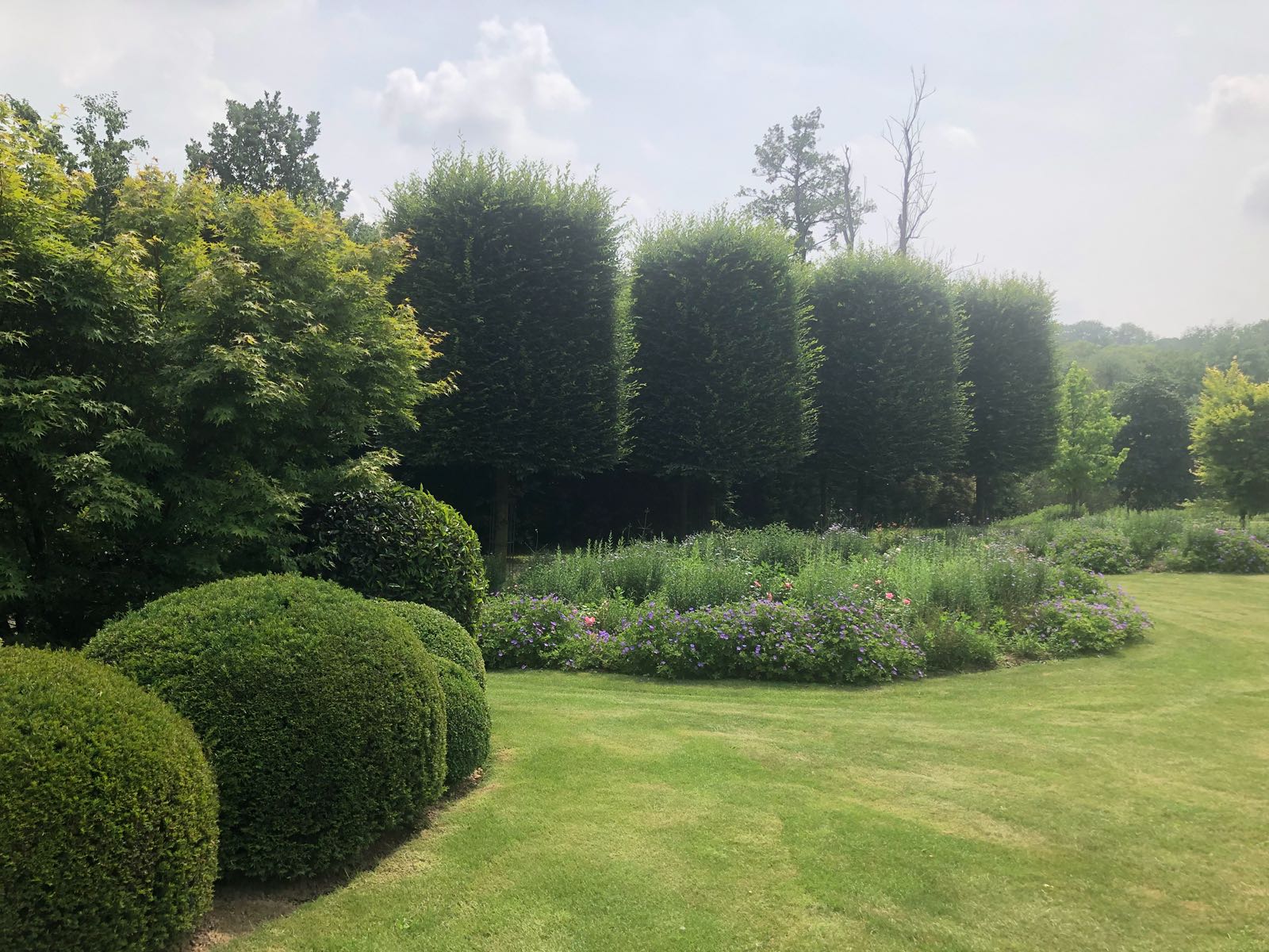 <span>R&eacute;alisations</span><i>→</i>