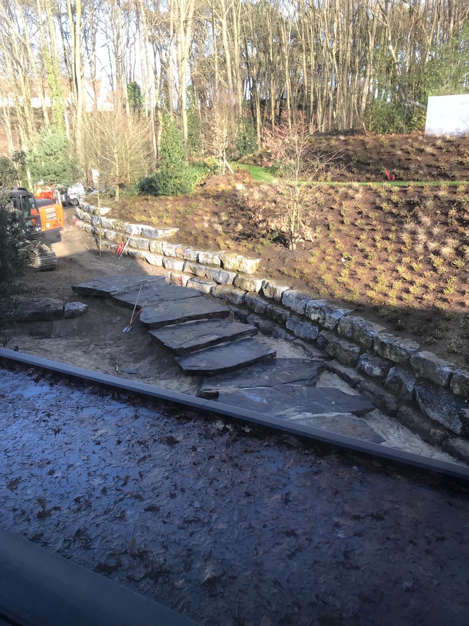 <span>R&eacute;alisations</span><i>→</i>