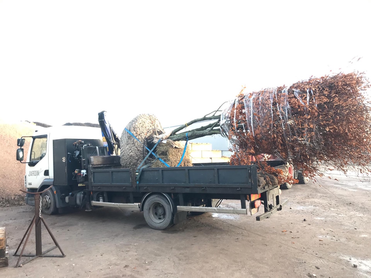 <span>R&eacute;alisations</span><i>→</i>