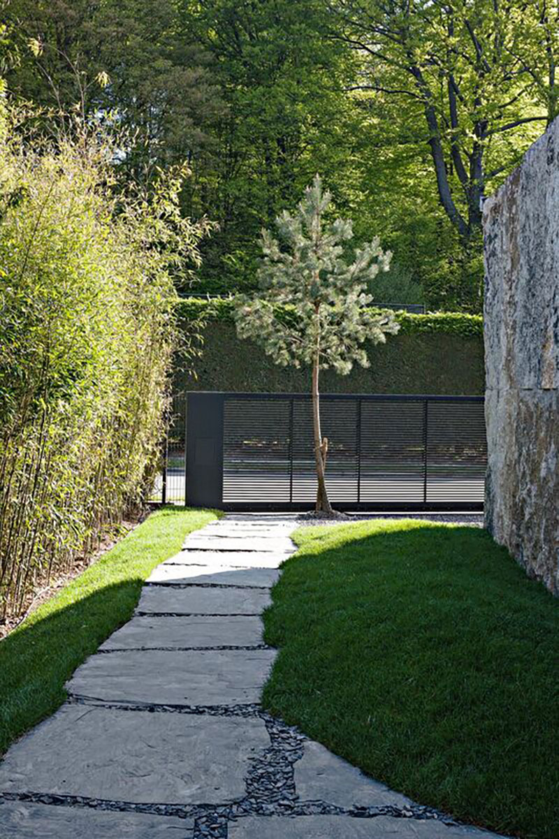 <span>R&eacute;alisations</span><i>→</i>